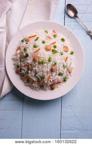 Yummy soya pulao or pilav or pulav or rice or soyabean chunk fried rice with peas and beans, indian or pakistani cuisine