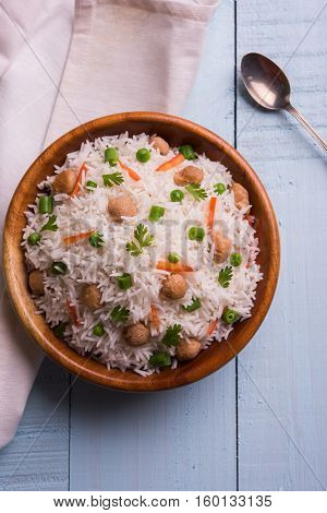 Yummy soya pulao or pilav or pulav or rice or soyabean chunk fried rice with peas and beans, indian or pakistani cuisine