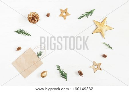 Christmas composition. Gift christmas decoration cypress branches pine cones. Flat lay top view