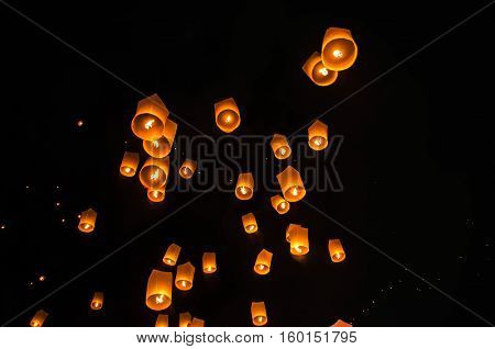Floating lanterns ceremony or Yee Peng ceremony, traditional Lanna Buddhist ceremony in Chiang Mai, Thailand