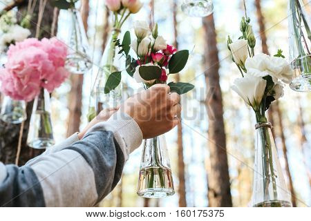 Wedding flowers decoration arch in the forest. The idea of a wedding flower decoration. wedding concept in nature.