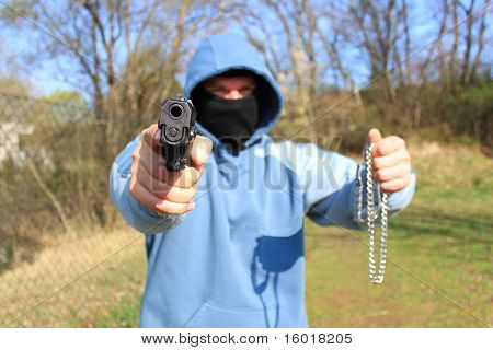 銃を持った強盗