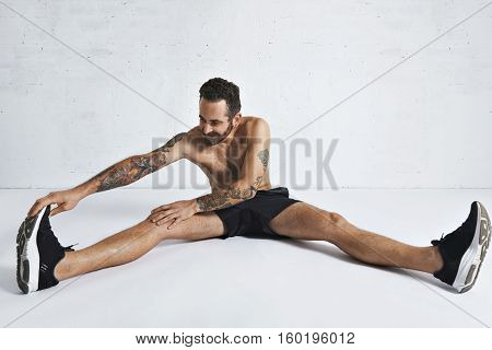Stretching Fitness Routine In White Room