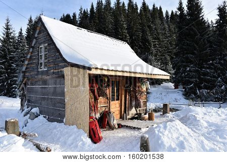 Cave Exploration Equipment Hanged On A Wooden Cabin