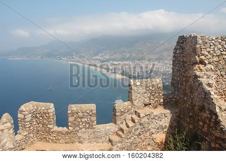 Walls fortress of Alanya Kale. Alanya Castle (Alanya Kalesi) is a medieval castle in the southern Turkish city of Alanya.
