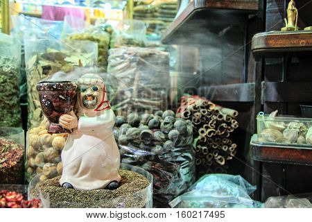 Closeup photo of bags filled with different kinds of spices spice souk Bur Dubai