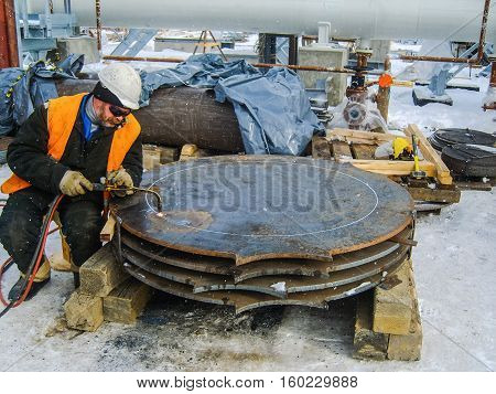 Safety at work. Welding and grinding of iron constructions. Industrial weekdays welders and fitters.