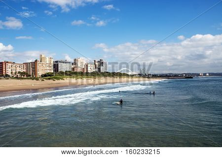 Cloudy Blue Sky At  Beachfront Against  City Skyline