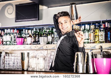 Flair bartender in action. Making freestyle moves at the bar