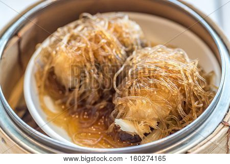 Chinese dim sum Sea Bass with vermicelli - Steamed Chinese groumet cuisine
