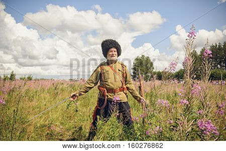 POKROVSKOE SVERDLOVSK OBLAST RUSSIA - JULY 17 2016: Historical reenactment of Russian Civil war in the Urals in 1919. Soldier Of The White Army
