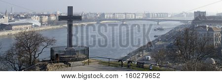 Budapest, the cross of the Gellert hill and the Danube