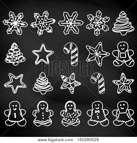 Set of hand-drawn outlined Christmas doodle cookies. Gingerbread men Christmas tree star snowflakes. Chalk on blackboard