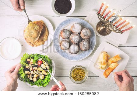 Hanukkah dinner with traditional dishes horizontal, ritual, background
