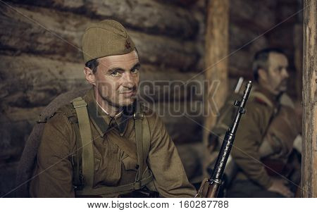 PERM RUSSIA - JULY 30 2016: Historical reenactment of World War II summer 1942. Soviet soldier with rifle