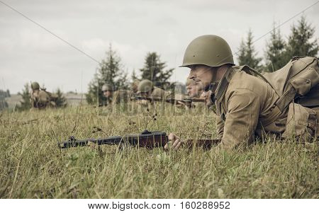 PERM RUSSIA - JULY 30 2016: Historical reenactment of World War II summer 1942. Soviet soldier with rifle