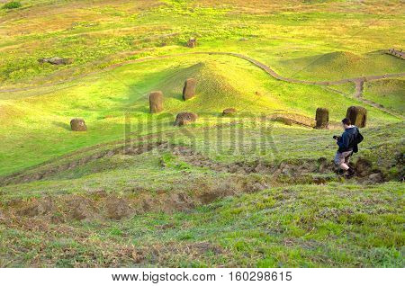 Photographer walking down stairs on Easter Island Chile