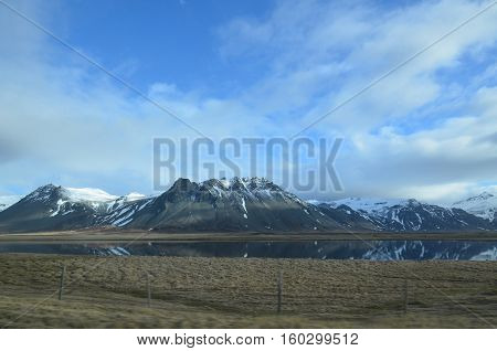 Tumultuos skies over the Rhyolite Mountains in Iceland.