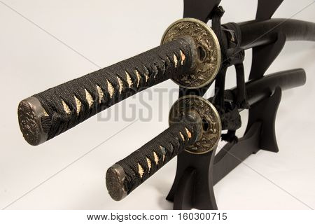 Japanese sword in a sheath of a black stone pattern