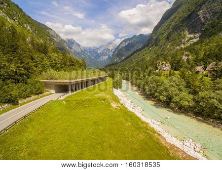 Aerial: Beautiful Mountain Valley Landscape With Tunnel And River View