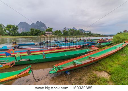 Long Tail Boats On Song River, Vang Vieng, Laos