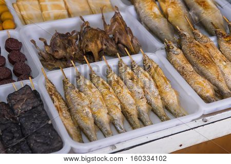 Salted Grilled Fish On The Grill In Market
