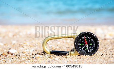 Compass In The Sand On The Beach