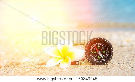 Compass In The Sand On The Beach.