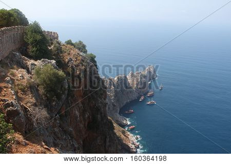 Alanya Castle / Walls fortress of Alanya Kale. Alanya Castle (Alanya Kalesi) is a medieval castle in the southern Turkish city of Alanya.