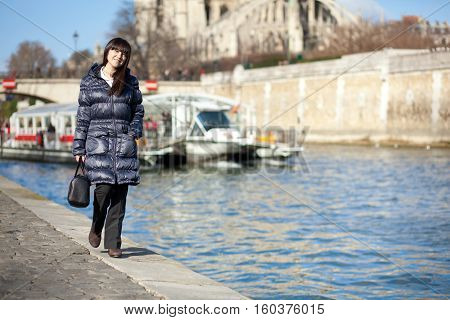 Beautiful Brunette Tourist Walking At The Emankment In Paris