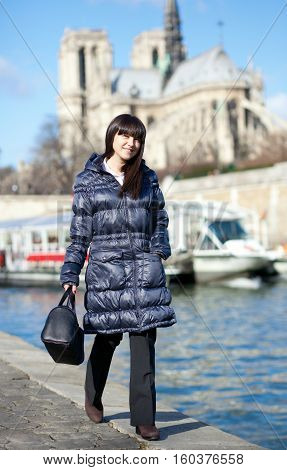 Beautiful Brunette Tourist Walking At The Emankment In Paris