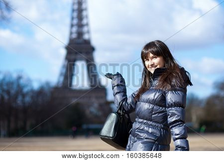 Smiling Tourist Near The Eiffel Tower