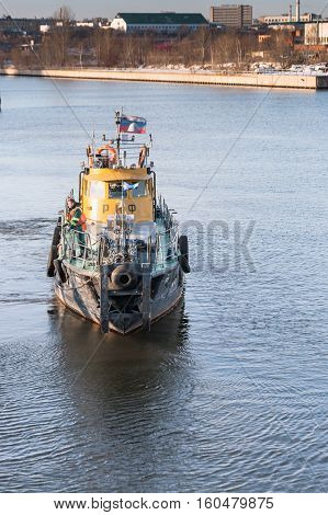 MOSCOW, RUSSIA - NOVEMBER 11, 2016: State Unitary Enterprise Mosvodostok performs recovery vessels on coastal winter parking. Ship of Mosvodostok on the Moscow River.