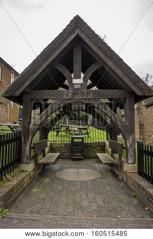 Wooden memorial shelter formerly housing the village pump. Erected to commemorate Queen Victoria's diamond jubilee in the village of Bearsted Kent UK
