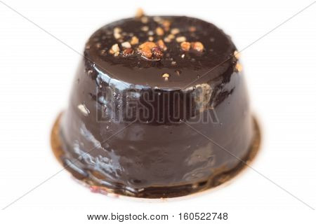Delicious chocalate pastry on white isolated background. Selective center focus narrow depth of field.
