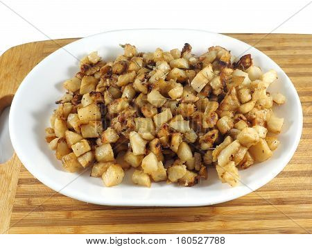 Pan-fried celery root (celeriac) on a dish