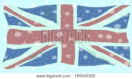 The British Union Flag or Union Jack with winter snow