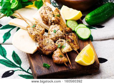 Chicken Souvlaki with pita and tzatziki.selective focus