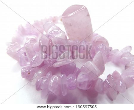 kunzite gemstone beads isolated on white background
