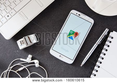 WROCLAW POLAND - DECEMBER 06th 2016: LG K10 with Google Maps application laying on desk. Google Maps is a desktop web mapping service developed by Google.