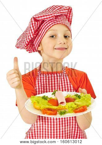 Portrait of a beautiful little girl holding plate with ham