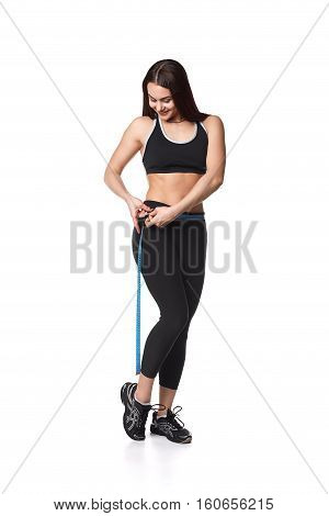 Athletic fitness woman helthy sport isolated white background young female health muscles copy space black clothes smilling attractive beautyful stretch activity