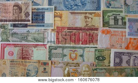 Lot of old banknotes of different countries of the world as background - Numismatics scene