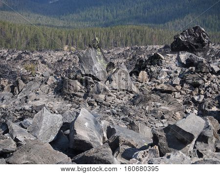 Jagged obsidian field on Obsidian Butte in Central Oregon on a fall day.