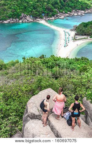 Travellers standing at the view point of Nang yuan island. Thailand