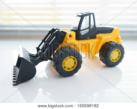 Toy Industrial Vehicle, Plastic Wheel Loader Excavator for Earth Moving Works at Construction Site, Miniature Earth Mover, Backhoe Loader, Frontend Loader with a Big Scoop, Heavy-duty Bulldozer