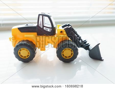 Toy Industrial Vehicle, Plastic Wheel Loader Excavator for Earth Moving Works at Construction Site, Miniature Earth Mover, Backhoe Loader, Frontend Loader with a Big Scoop, Heavy-duty Bulldozer