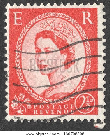 MOSCOW RUSSIA - NOVEMBER 2016: a post stamp printed in the UNITED KINDOM shows a Portrait of Queen Elizabeth II circa 1955 -1957