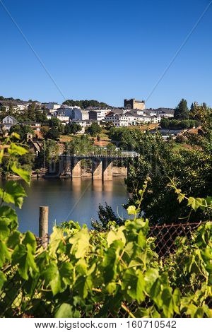 Roman bridge over the Minho River in Portomarin Spain