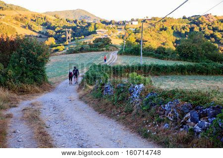 GALICIA SPAIN - AUGUST 10: Pilgrimns along the way of St. James on 10 2016